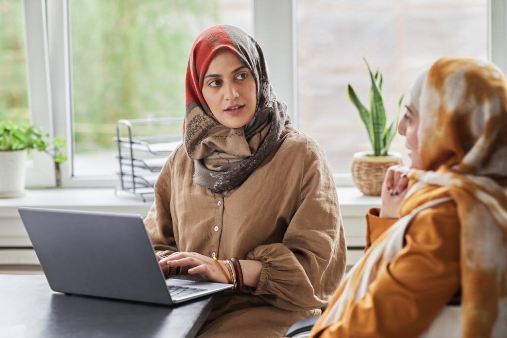 A Woman using Laptop on the Office